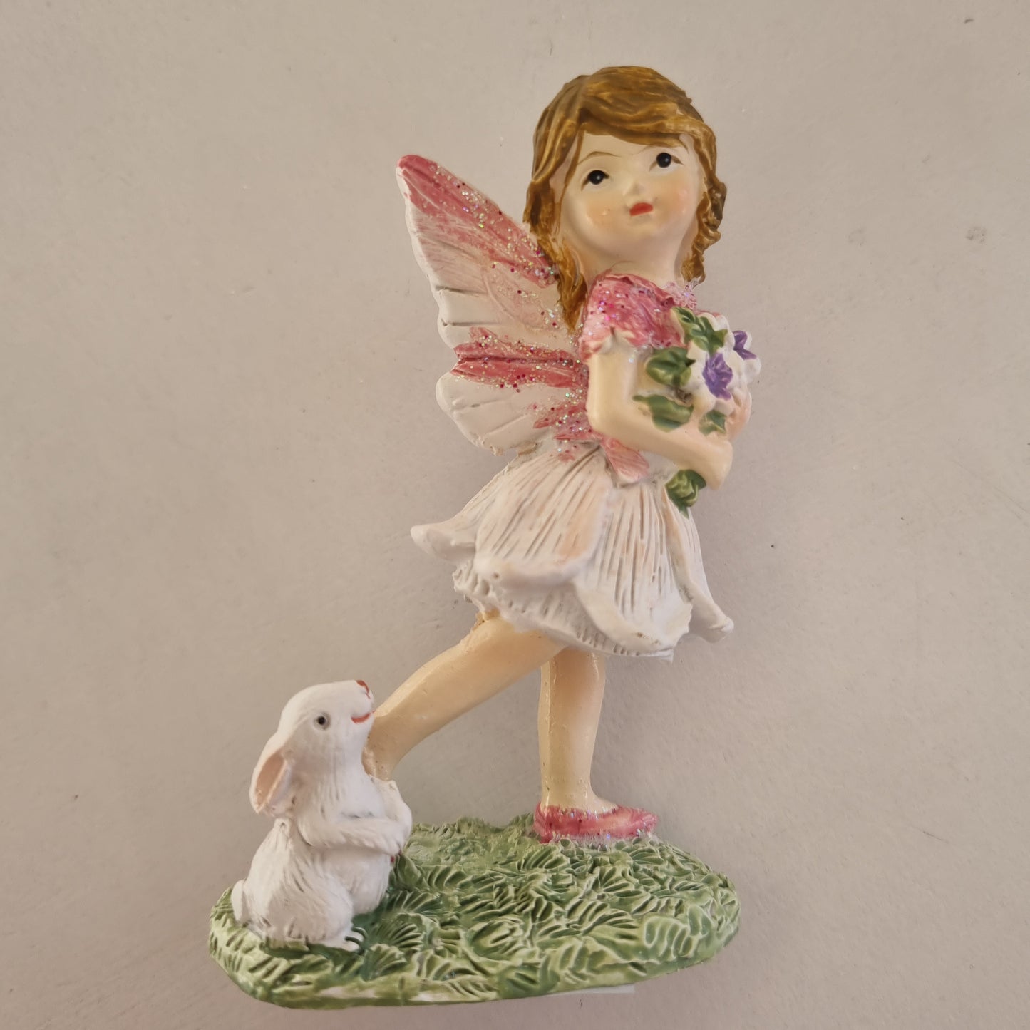 Fairies Holding Flowers with Rabbit Friend