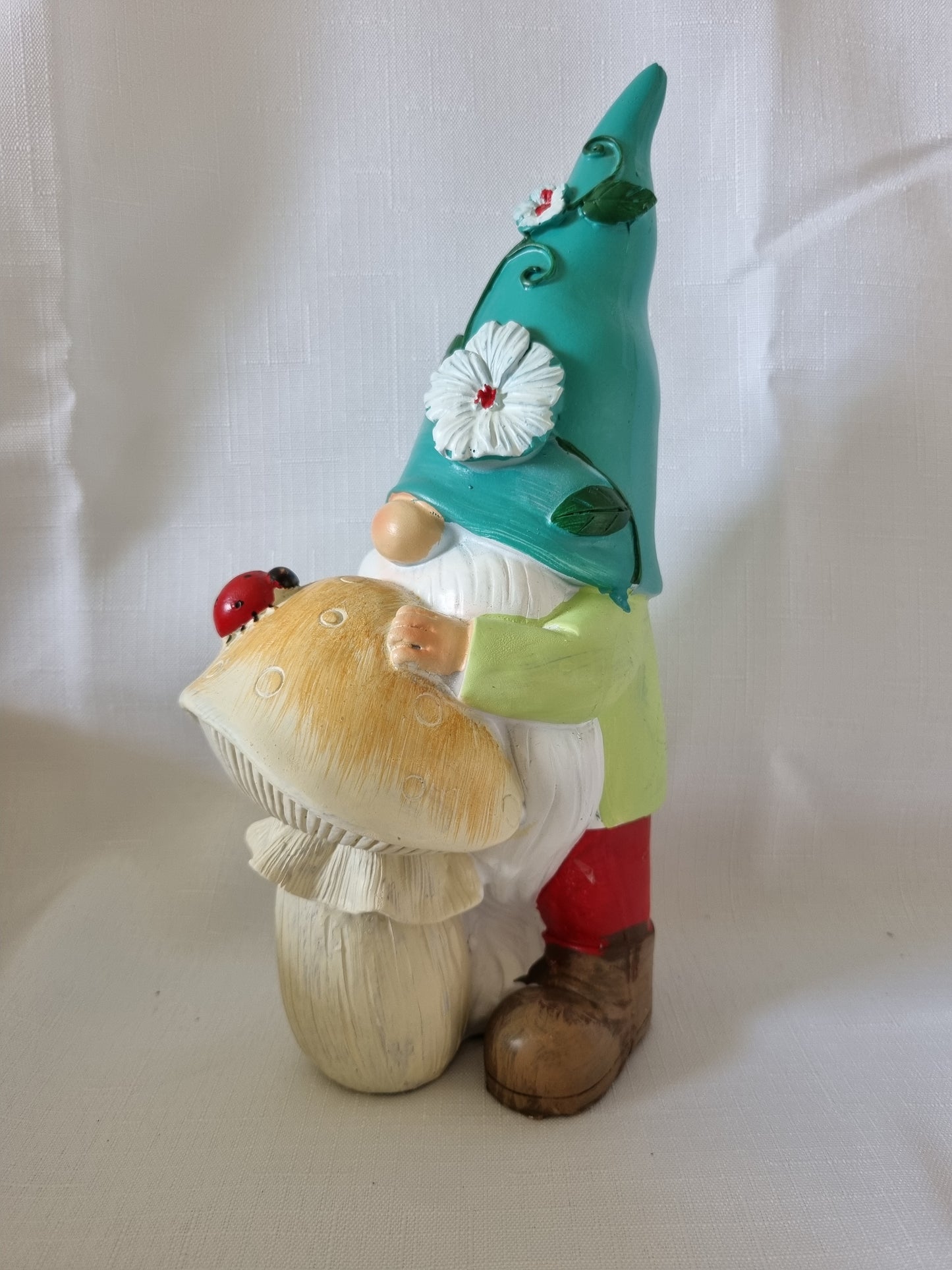 Garden Gnome Resting on Mushroom